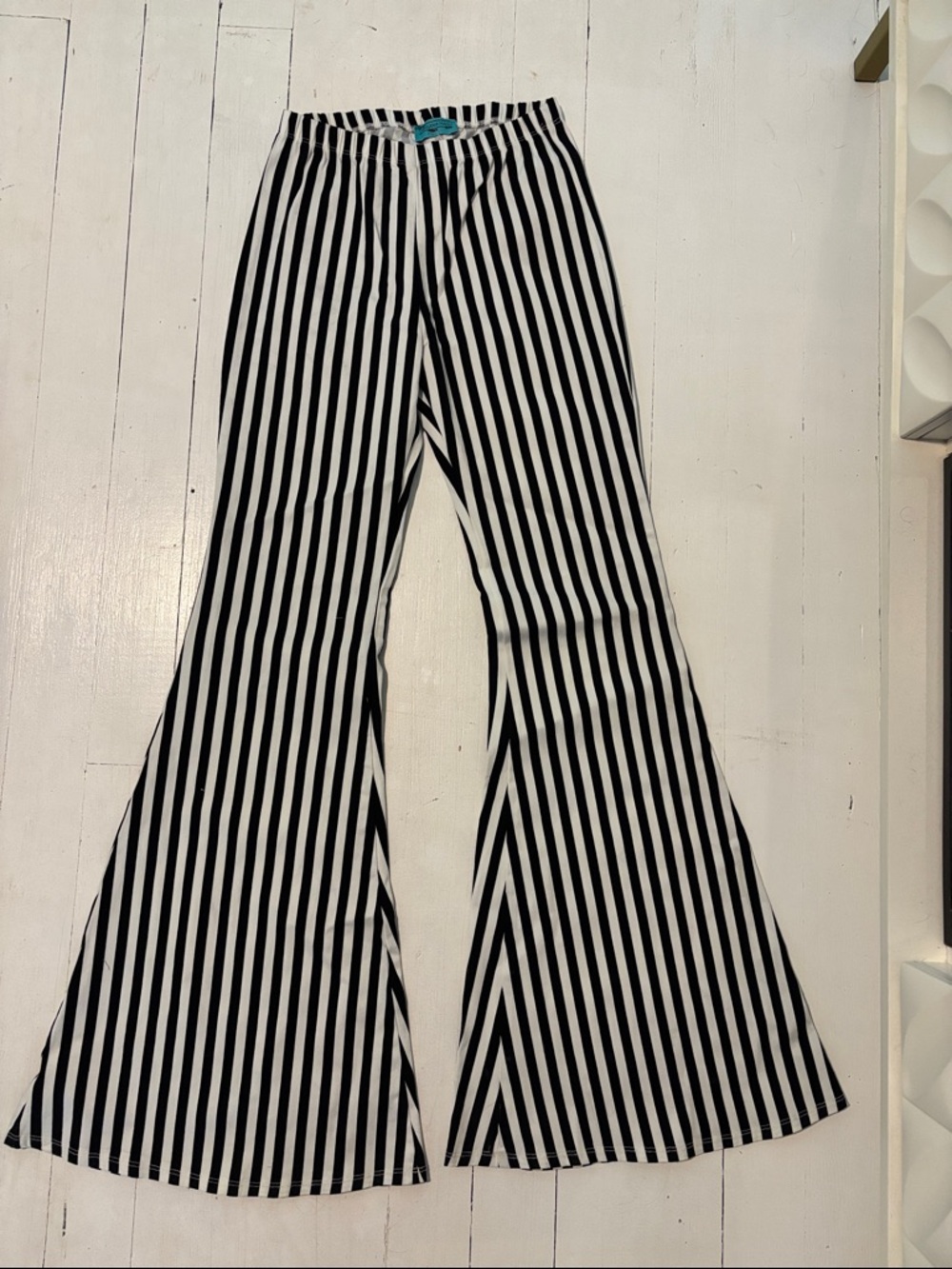 Black & White Vertical Stripe Flare Pants - Women